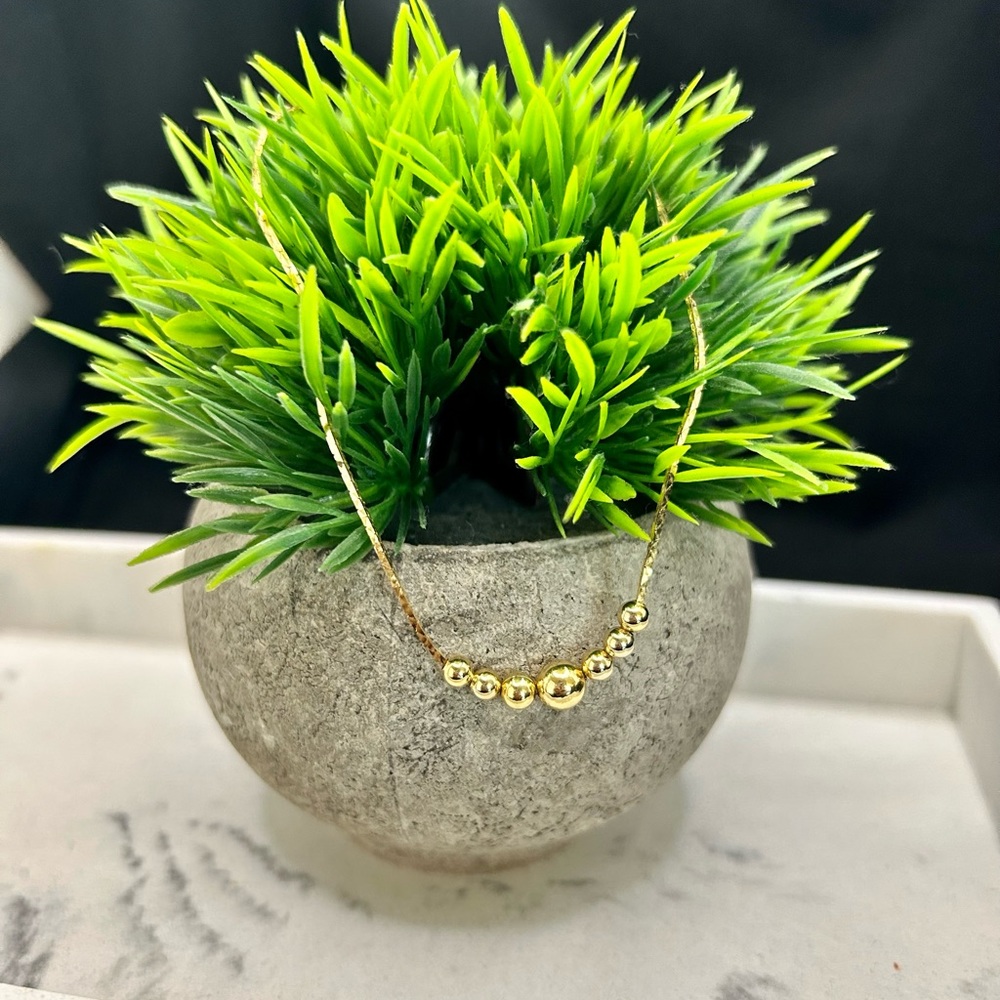 16” gold plated chain with 7 gold plated beads